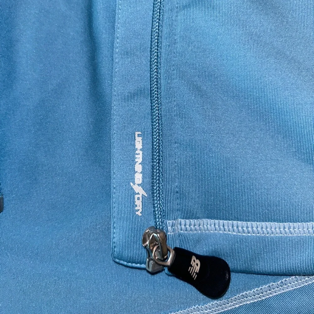 New Balance NB women’s baby blue full‎ zip Lightning Dry jacket size LARGE